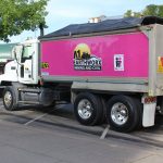 A pink A1 Earthworx truck